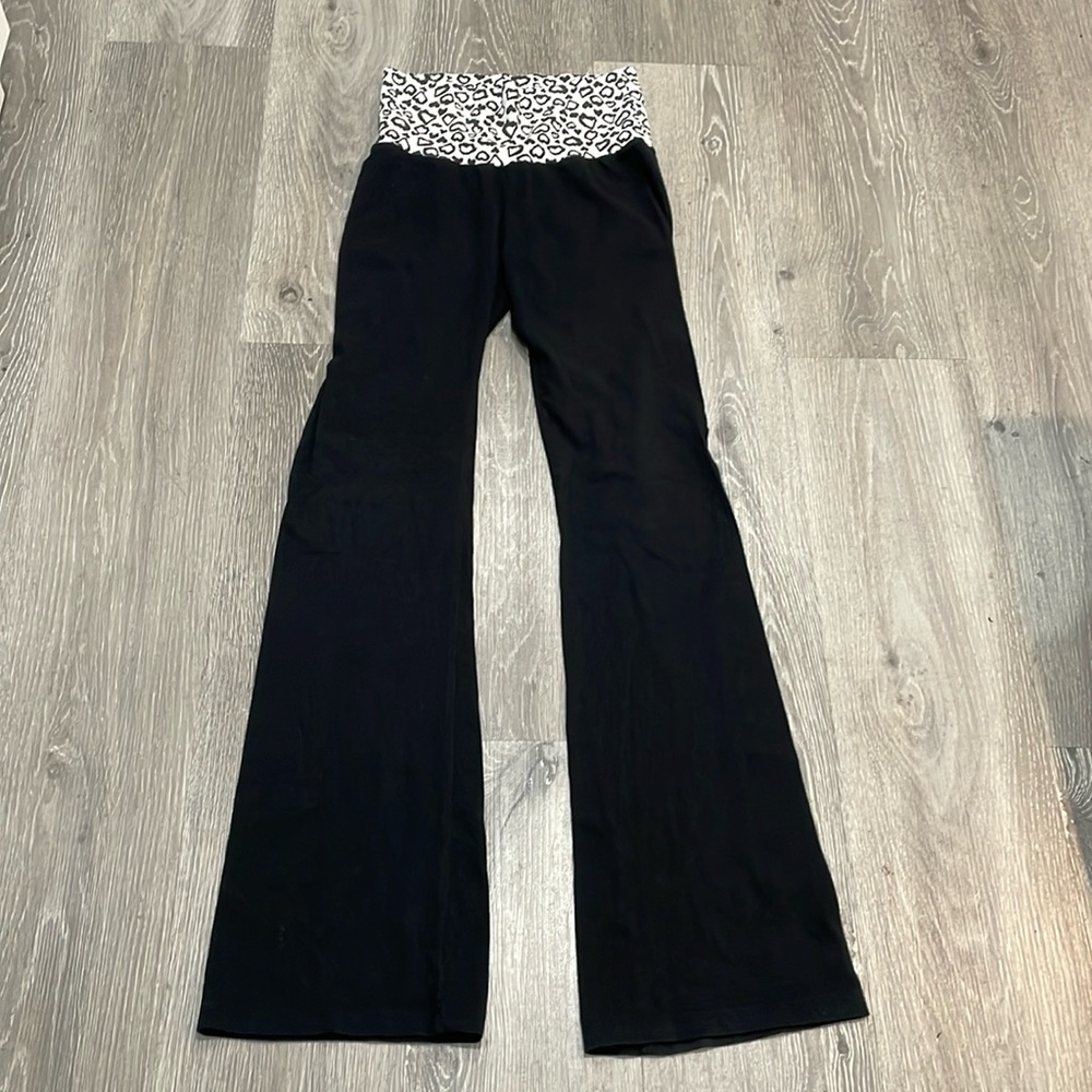 Black leggings with a bell bottom flare